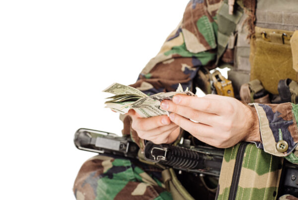 Soldier counting cash